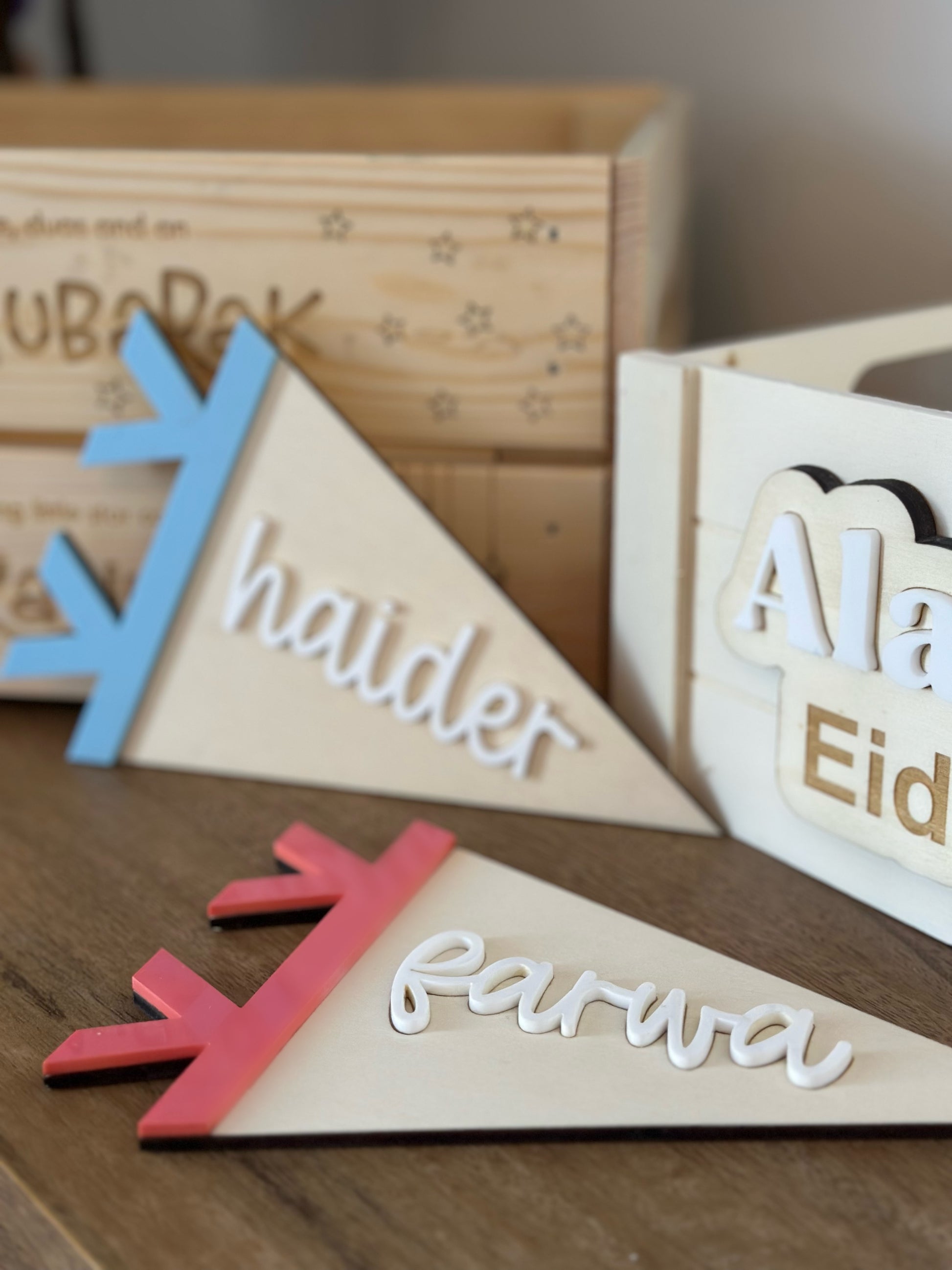 A wooden, personalised Eid Treats gifting crate/box, perfect for presenting Eid gifts to Muslim children during Ramadan/on Eid.